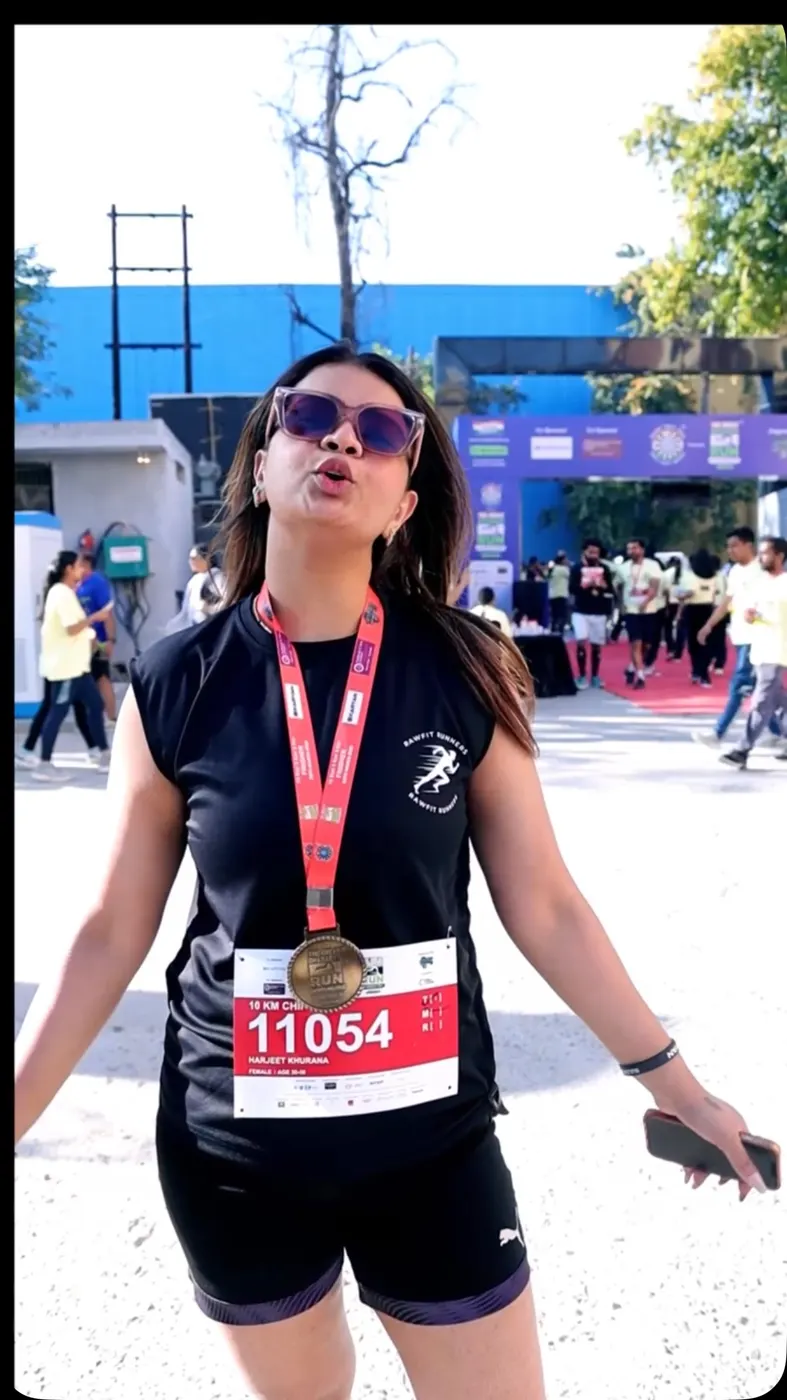 RawFit member with her race medal