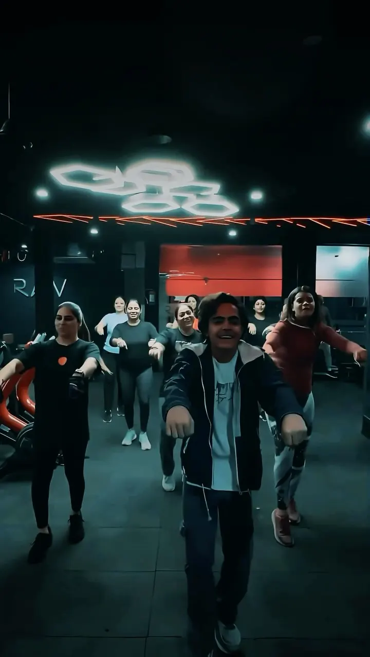 Zumba class under neon lights